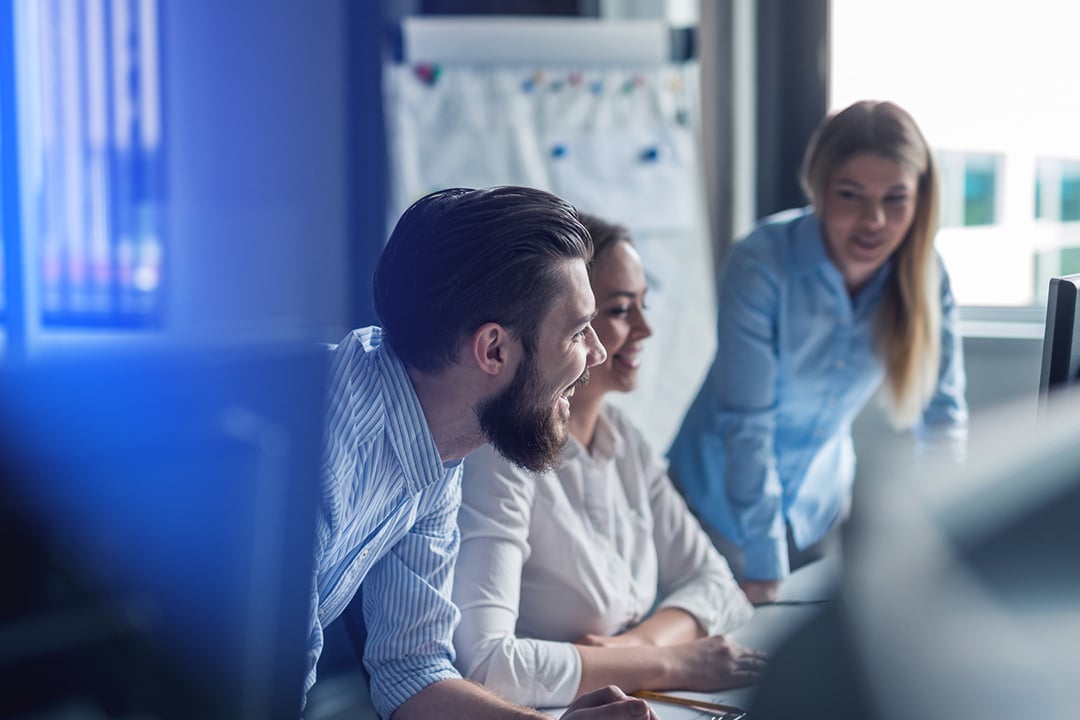 People collaborating on desk