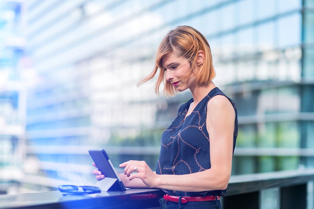 Woman checking tablet 